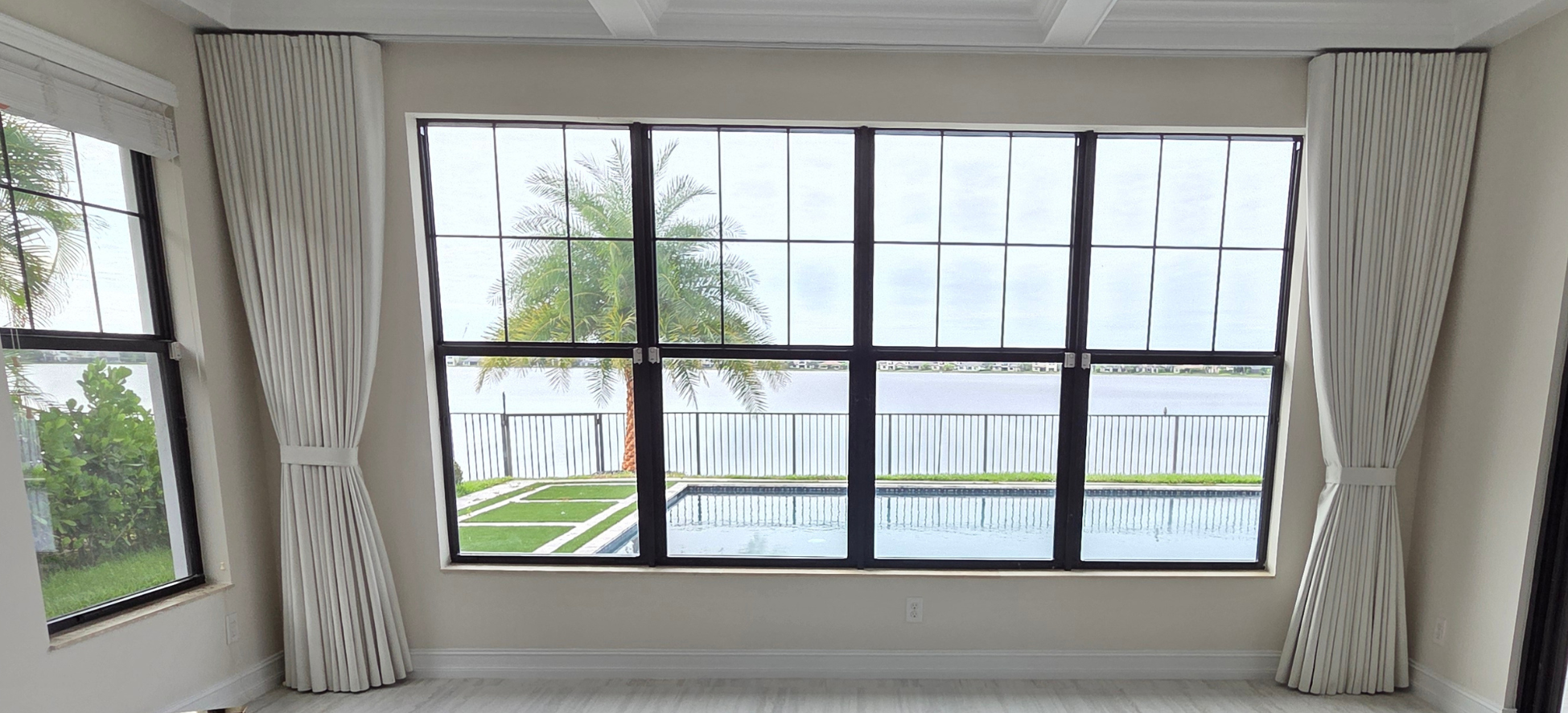drapery, roller shades, roller blinds, sliding panel, roman shades, zebra shades, window tints / films